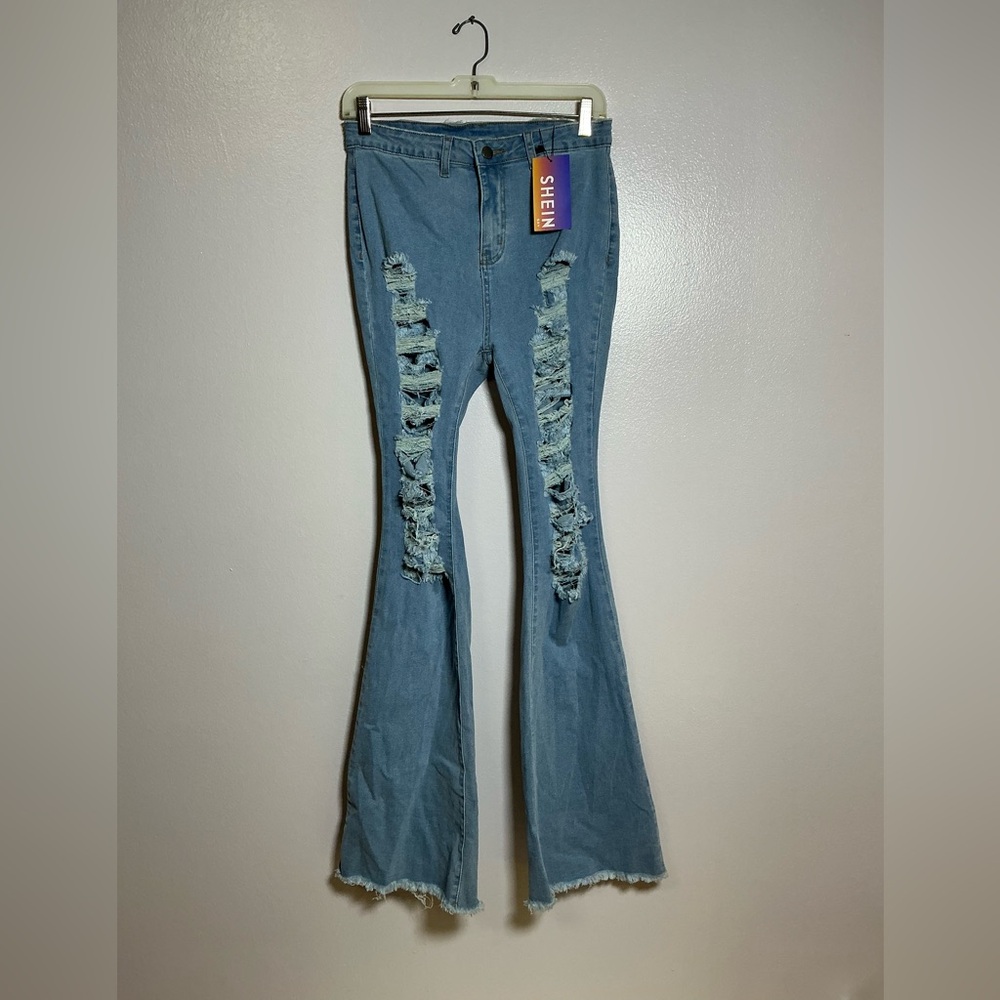 SHEIN Light Blue Ripped Flare Jeans
